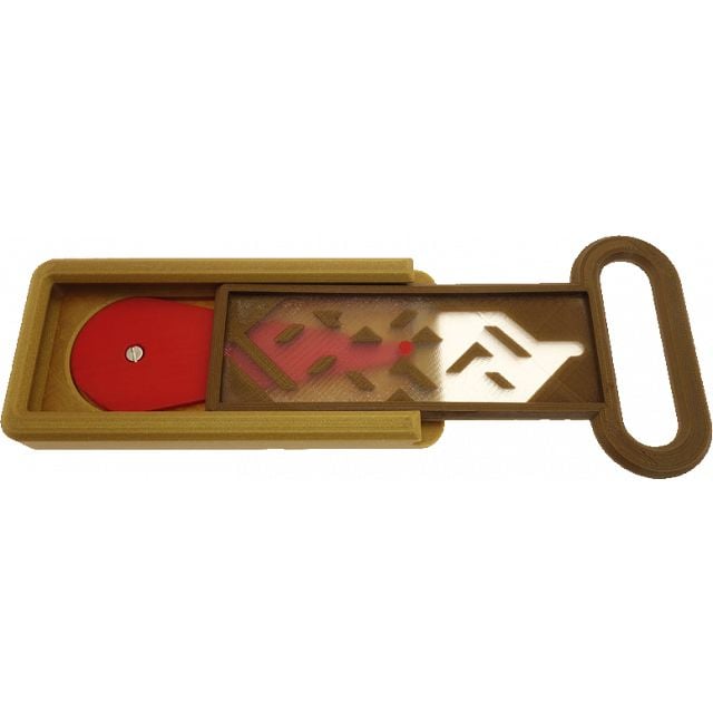 plastic piece with transparent overlay over a textured maze. it is trying to slide into a container