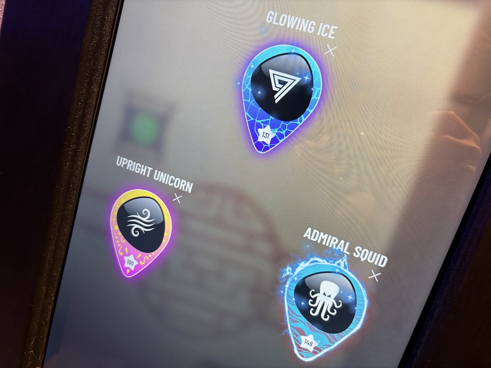 Player check-in screen at Level99 for players: Admiral Squid, Glowing Ice, and Upright Unicorn.