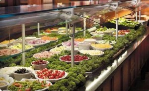 salad bar at pizza hut, decorated with curly kale