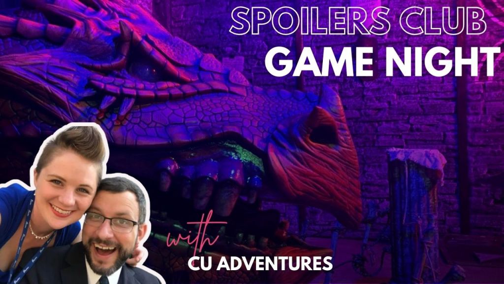 hero image for spoilers club game night background of animatronic dragon in dark blues and purples. woman with blonde fauxhawk with blue eyes and blue dress. man in suit with short brown hair, glasses, and beard. Both grinning happily