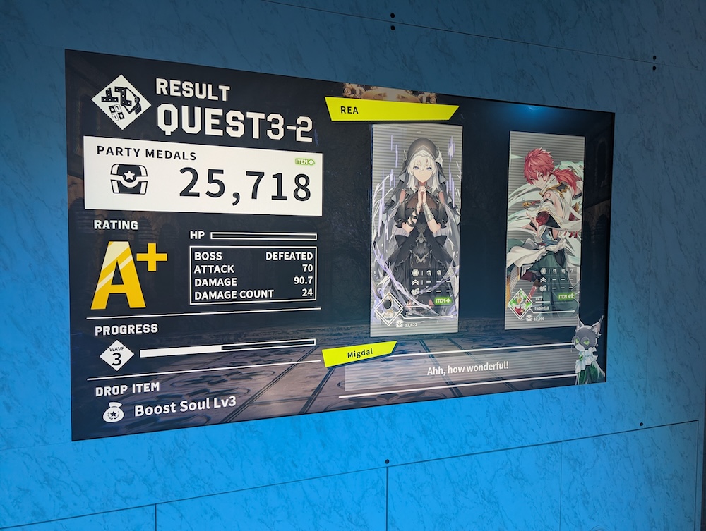 A results screen for Quest 3-2, where the party received an A+ rating, defeated the boss, attacked 70 times, and took 90.7 damage over 24 hits. The players' companions, a white haired character in a nun-esque outfit with arms clasped in prayer and a warrior with a red ponytail appear next to the results. Migdal, the priestess companion remarks "Ahh, how wonderful!" as Geo the cat is in the bottom right corner.