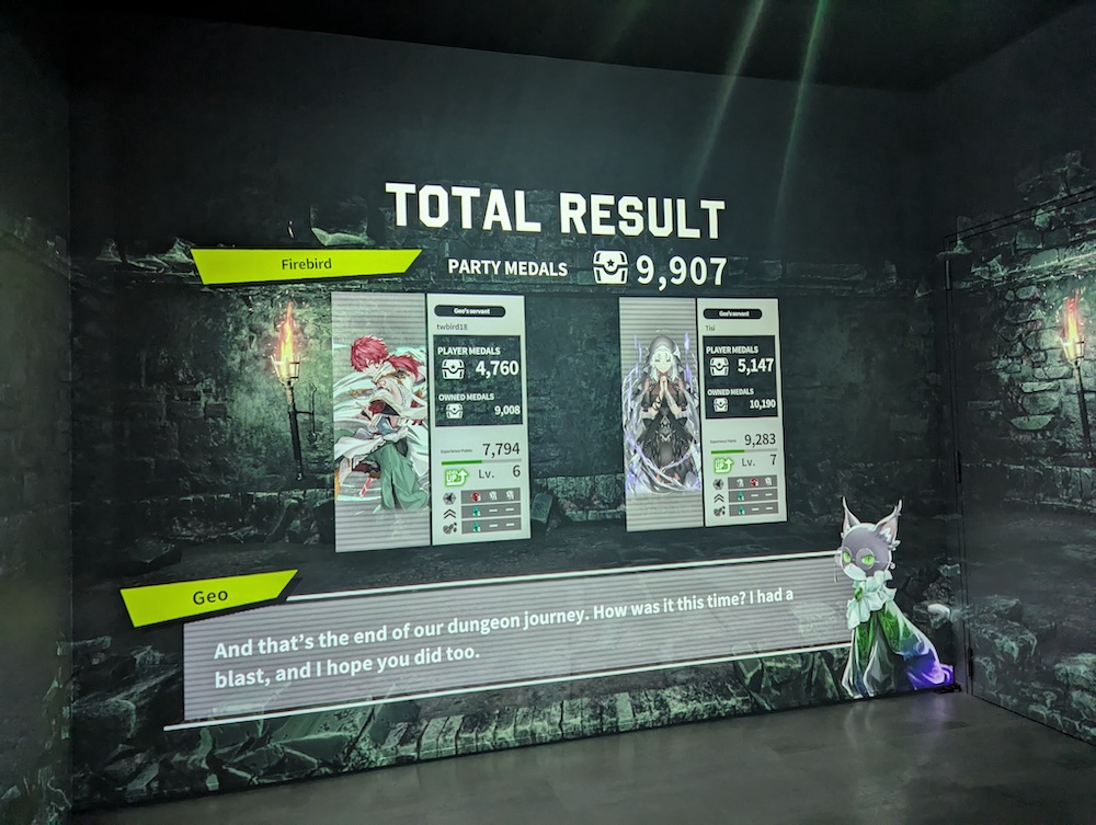 A total results screen is projected onto a large wall. Geo the cat says "And that's the end of our dungeon journey. How was it this time? I had a blast, and I hope you did too.".