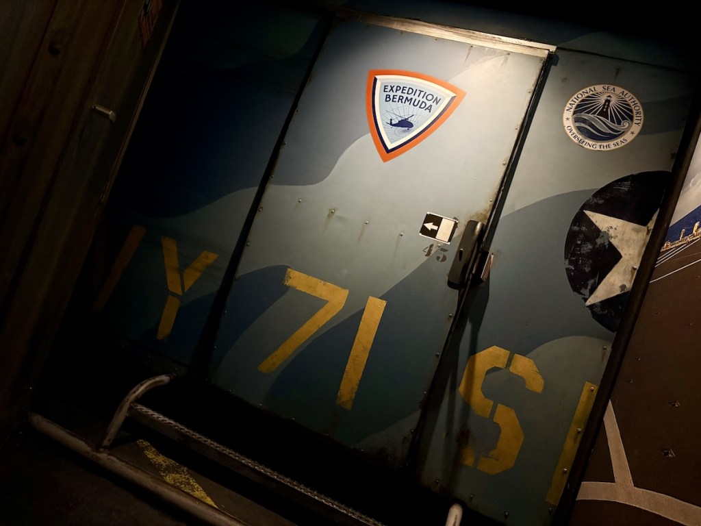 The exterior of a the loading door for a helicopter from the National Sea Authority. The door is closed.