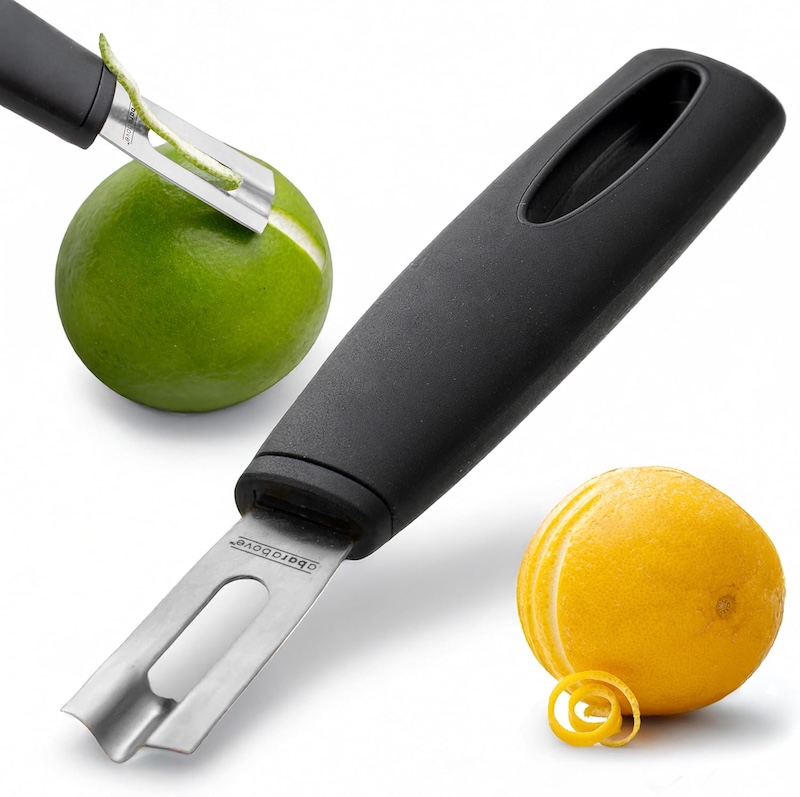 A citrus garnish hand-tool with a channel knife blade. The image also shows the blade being dragged over a lime and cutting a thin strand of rind.