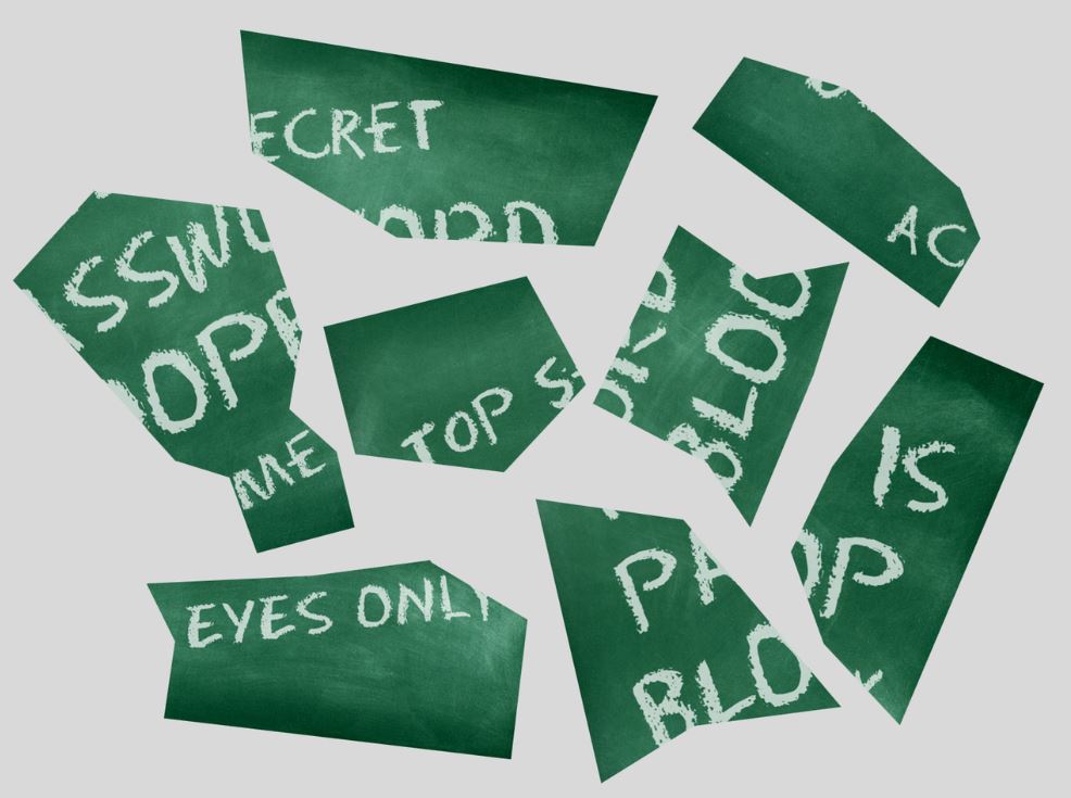 chalkboard with message shattered into jigsaw pieces