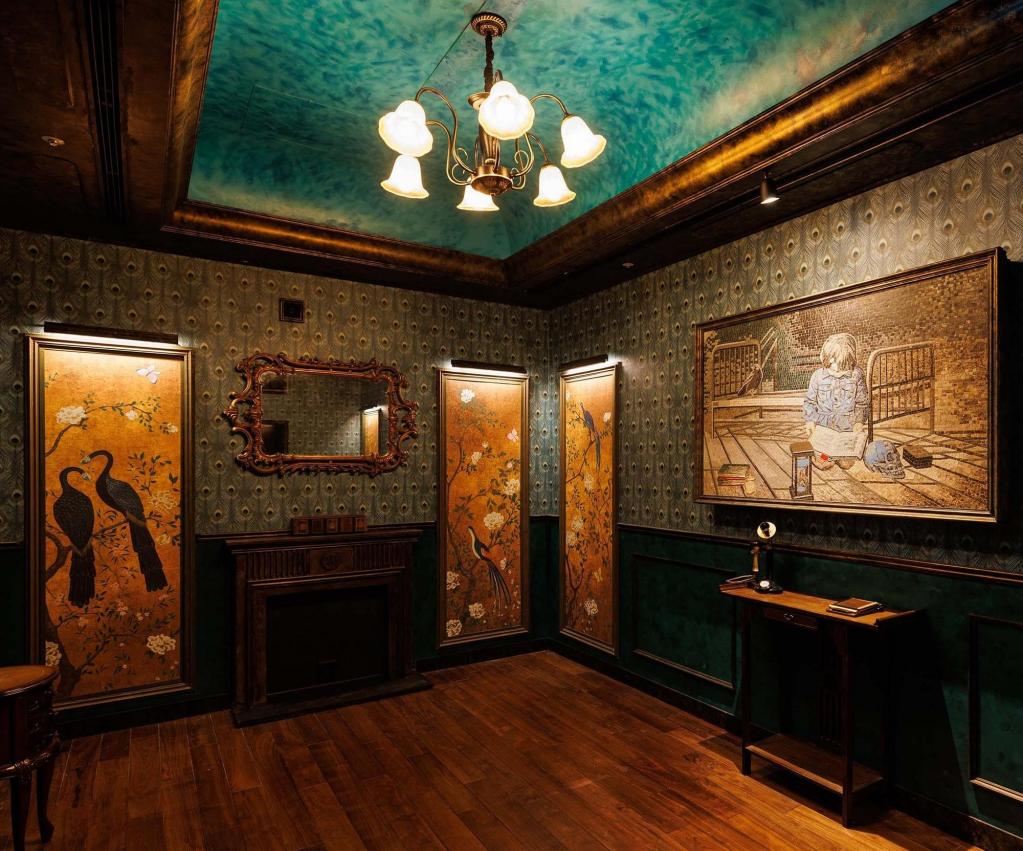 An elegant salon with peacock wallpaper, gilded frames, and a turquoise ceiling