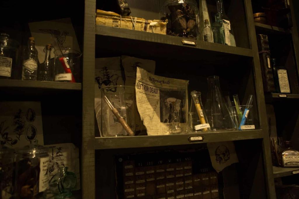 Apothecary shelves lined with scientific vials and newspaper articles