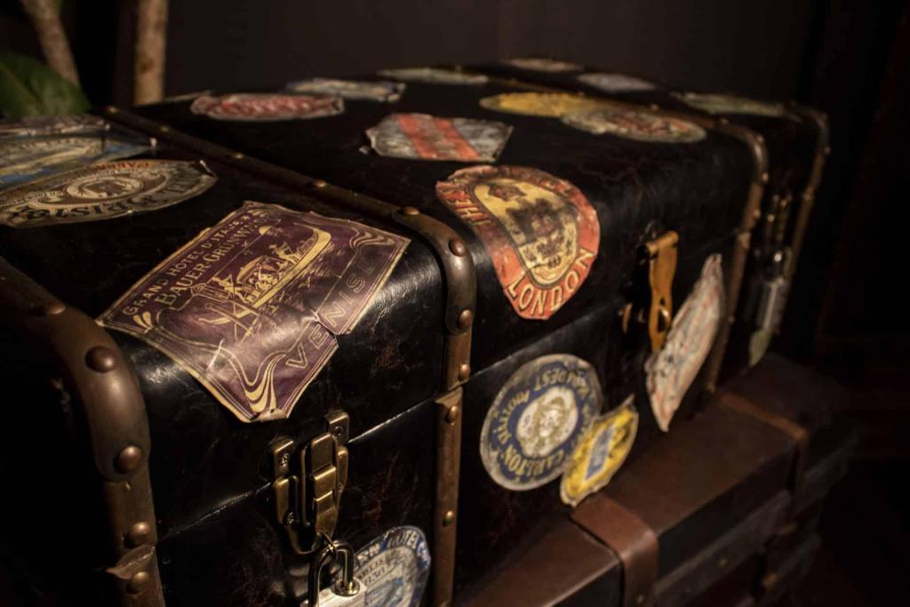 An old leather suitcase covered with stickers from various international locations