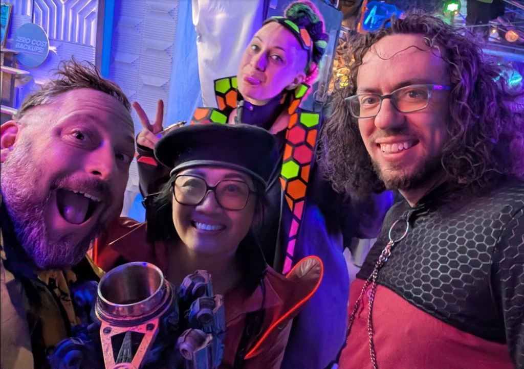 group of friends dressed in cyberpunk outfits