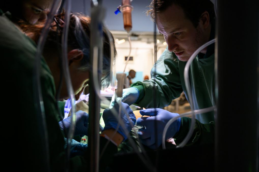 surgeons operating on patient