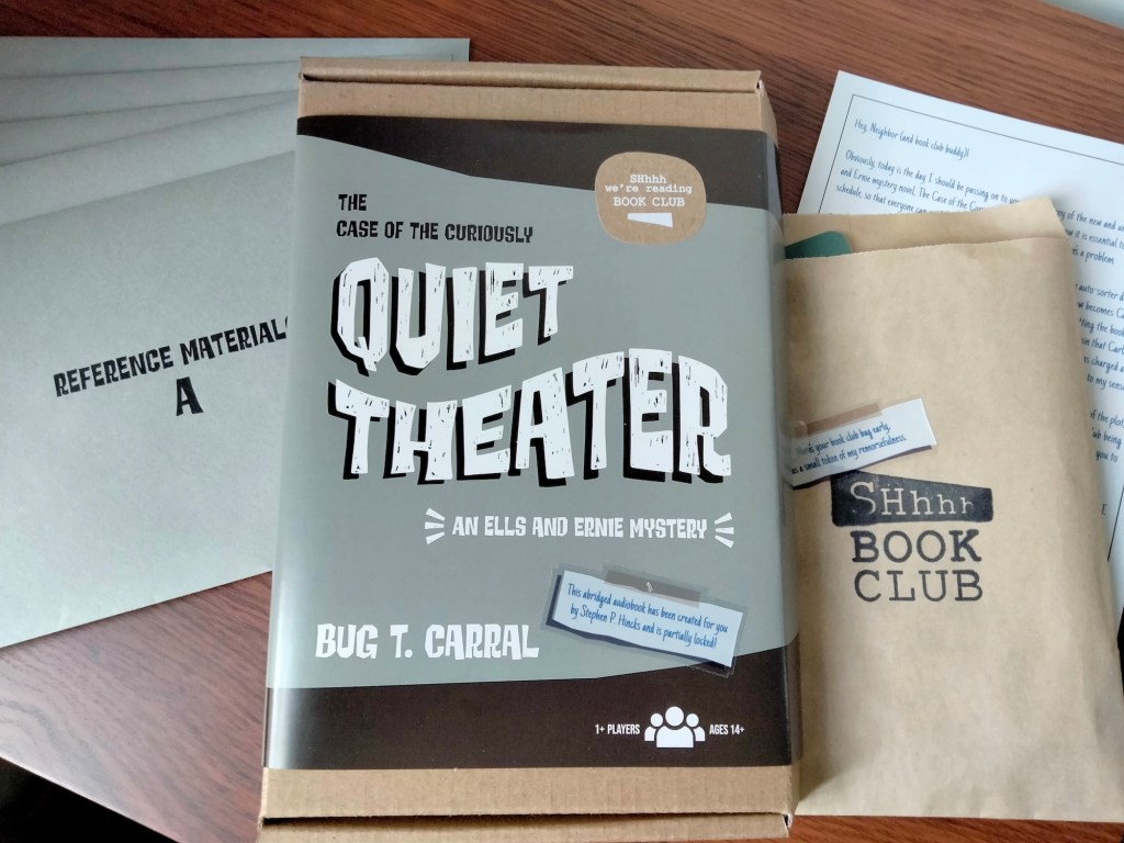 Game box for The Case of the Curiously Quiet Theater, next to envelopes of reference materials and a small bag marked "SHhhh Book Club"