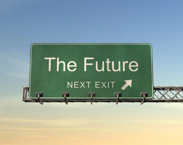 highway sign that says "The Future, Next Exit"
