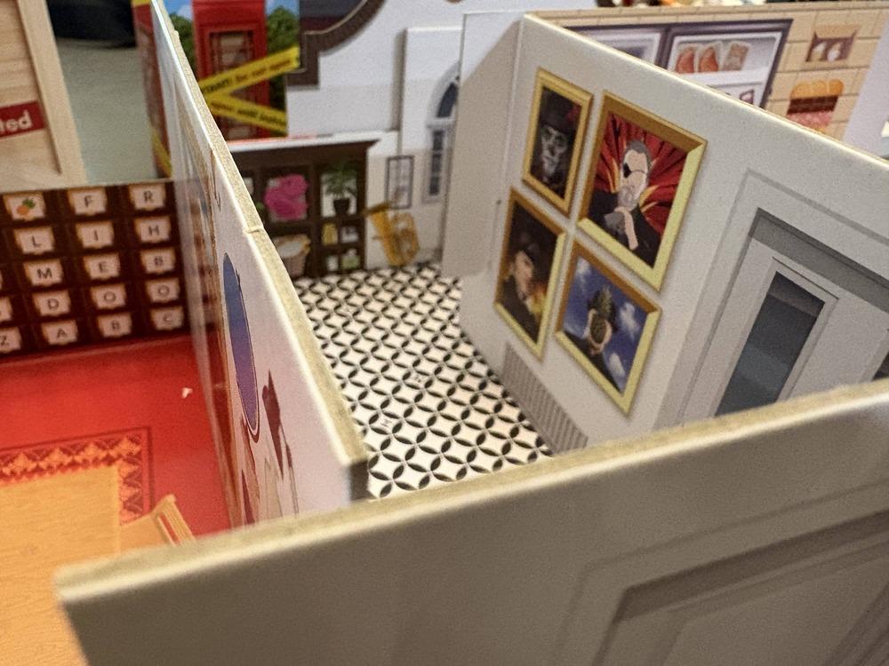 A close up on a 3D replica of the Taskmaster house. It's the size to sit on a table.