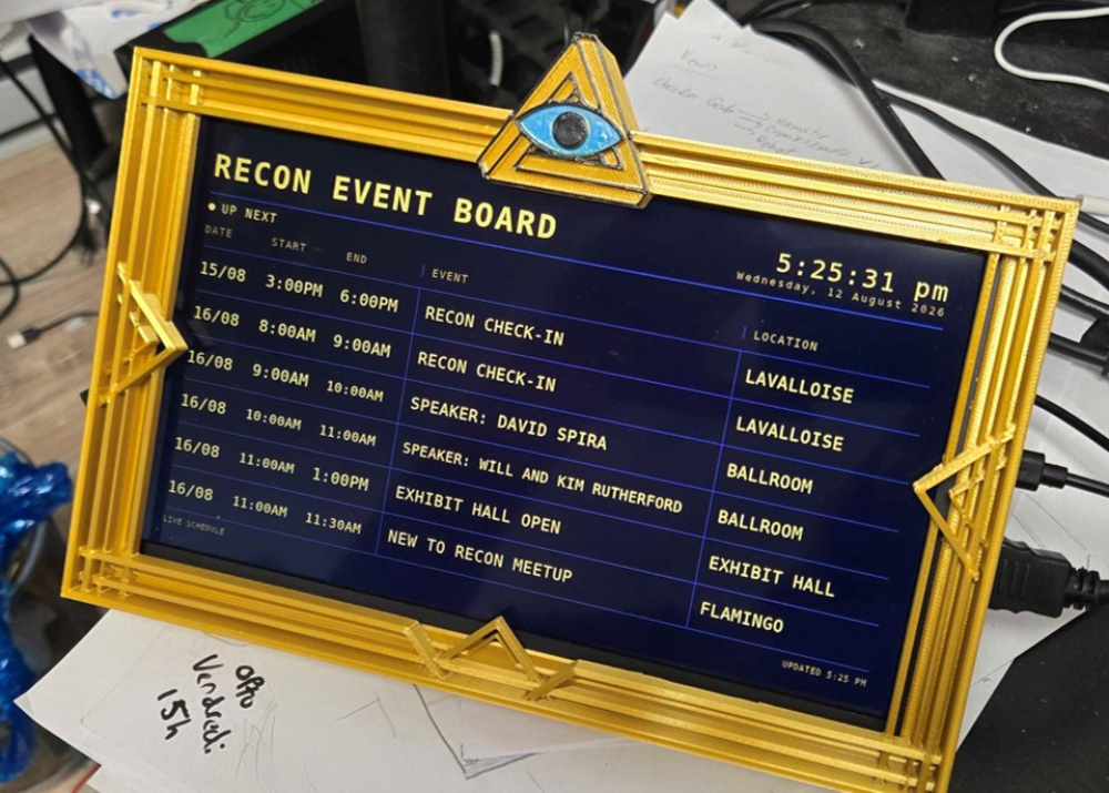 Image of the RECON Event board. Displaying the schedule of events and locations.